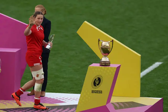 Canada's lock Sophie de Goede receives the player of the tournament trophy
