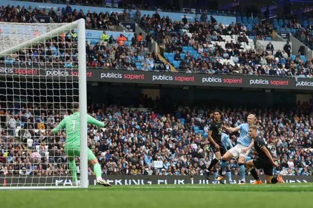 Manchester City's Erling Haaland scores their fourth goal