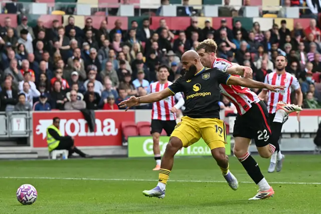 Bryan Mbeumo (L) is fouled by Brentford's Irish defender Nathan Collins