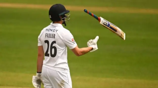 James Fuller throws the bat in frustration