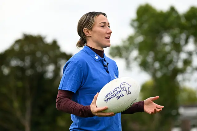 Lucy Bronze looks on
