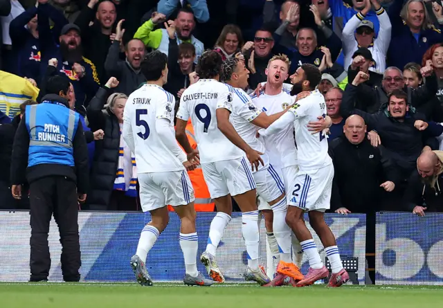 Sean Longstaff of Leeds United celebrates scoring his team's second goal with teammates during the Premier League match between Leeds United and Bournemouth at Elland Road on September 27, 2025 in Leeds, England.