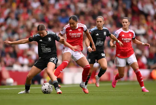Rachel Maltby of Aston Villa is challenged by Olivia Smith of Arsenal during the Barclays Women's Super League match between Arsenal and Aston Villa at Emirates Stadium on September 27, 2025 in London, England.