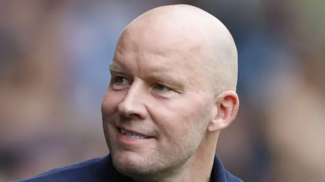 Sheffield Wednesday boss Henrik Pedersen smiling.