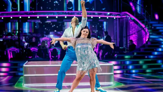 Ellie Goldstone and partner