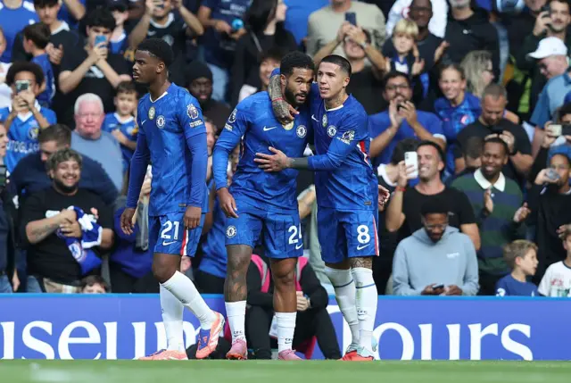 Chelsea's Argentinian midfielder #08 Enzo Fernandez (3L) celebrates scoring the team's first goal