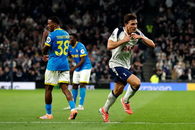 Tottenham Hotspur's Portugese midfielder #06 Joao Palhinha celebrates scoring the team's first goal