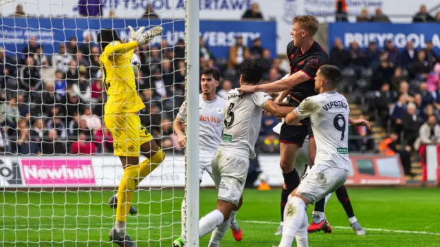 Millwall FC forward Josh Coburn (19) heads a goal to equalise
