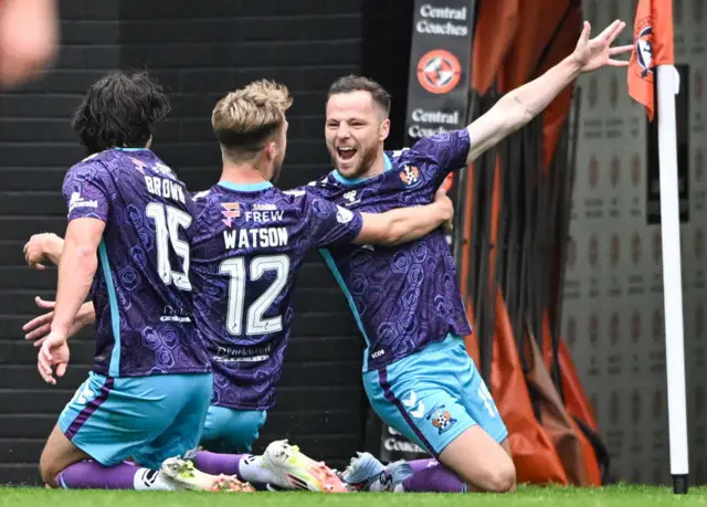 Bruce Anderson celebrates