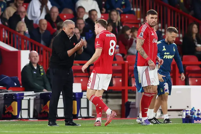 Ange Postecoglou, Manager of Nottingham Forest, gives instructions to Elliot Anderson