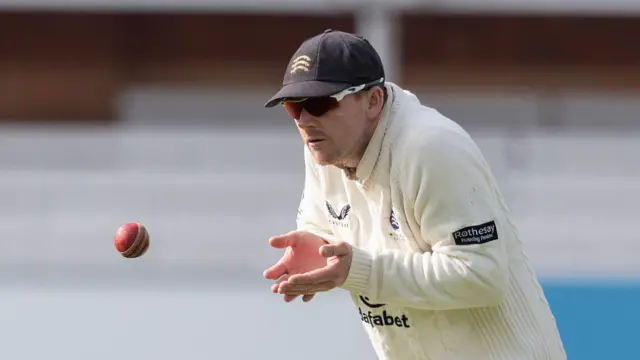 Sam Robson catching a ball