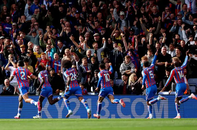 Ismaila Sarr of Crystal Palace celebrates scoring his team's first goal with teammates during the Premier League match between Crystal Palace and Liverpool at Selhurst Park on September 27, 2025 in London, England.