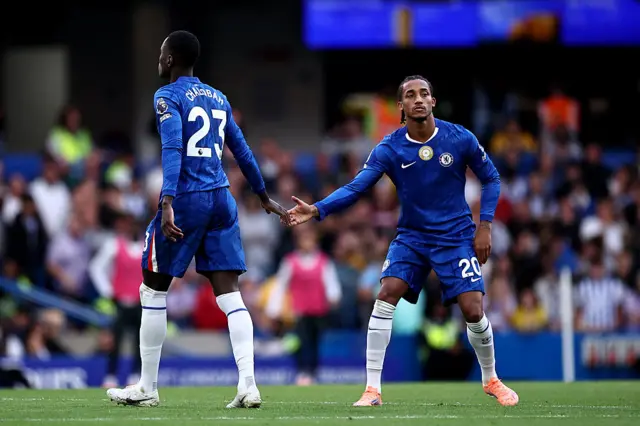 Chelsea's English defender #23 Trevoh Chalobah (L) leaves the pitch after being shown a red card