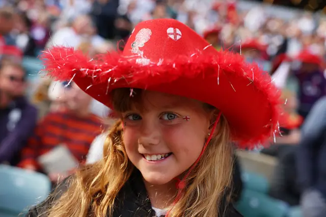An England fan poses