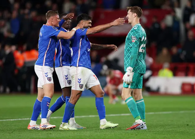 Omar Alderete and Robin Roefs of Sunderland celebrate victory