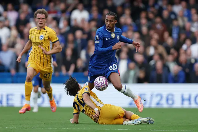 Joao Pedro of Chelsea is tackled by Ferdi Kadioglu