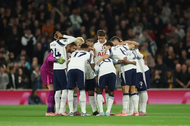 Players of Tottenham Hotspur form a huddle