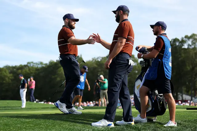 Tyrrell Hatton and Jon Rahm in the Saturday Foursomes on day two of the 2025 Ryder Cup