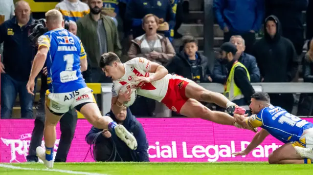 Jake Connor pushes Jon Bennison into touch