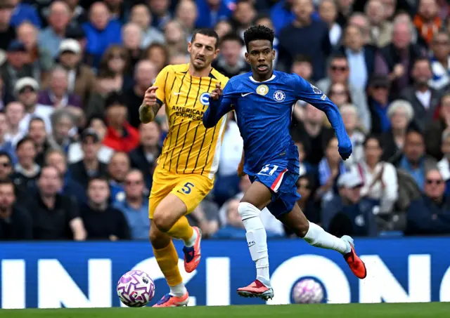 Estevao of Chelsea runs with the ball during the Premier League match between Chelsea and Brighton & Hove Albion at Stamford Bridge on September 27, 2025 in London, England.
