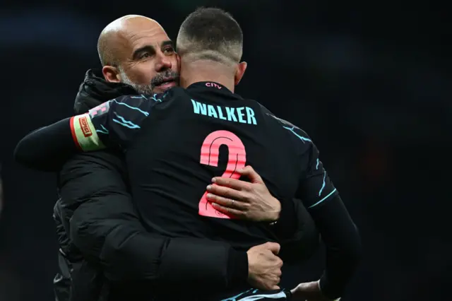 Pep Guardiola hugs Kyle Walker