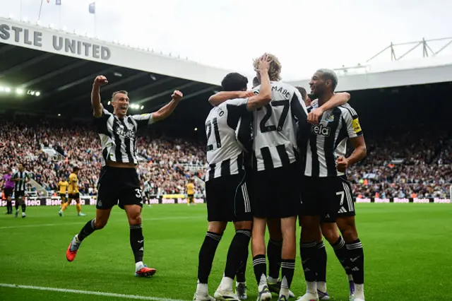 Nick Woltemade of Newcastle United (27) celebrates with teammates