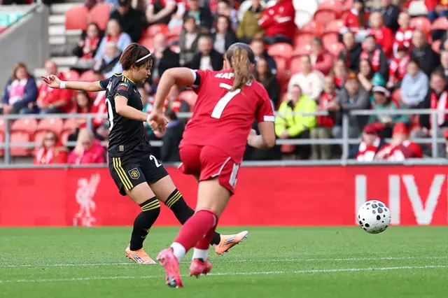 Hinata Miyazawa of Manchester United scores her team's first goal during the Barclays Women's Super League match between Liverpool and Manchester United at Totally Wicked Stadium on September 28, 2025 in St Helens, England.