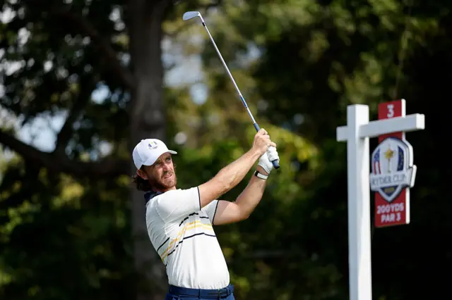 Tommy Fleetwood tees off at the third