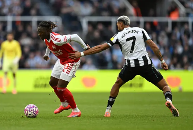 Eberechi Eze of Arsenal gets past Joelinton