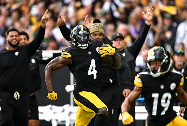 Wide receiver DK Metcalf #4 of Pittsburgh Steelers on his way to scoring a touchdown during the 2025 NFL International Game