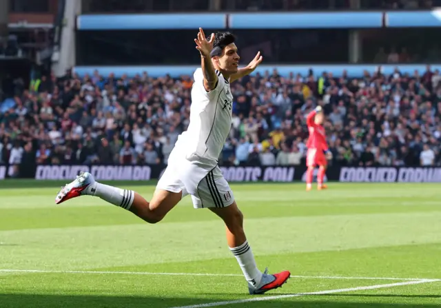 Raul Jimenez celebrates after scoring for Fulham against Aston Villa at Villa Park