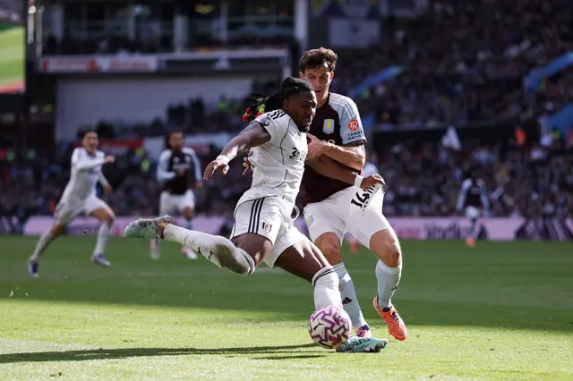 Adama Traore and Pau Torres challenge for the ball at Villa Park