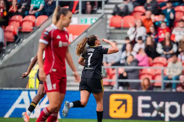 Ella Toone of Manchester United celebrates scoring a goal to make the score 0-2 during the Barclays Women's Super League match between Liverpool and Manchester United at Totally Wicked Stadium on September 28, 2025 in St Helens, England.