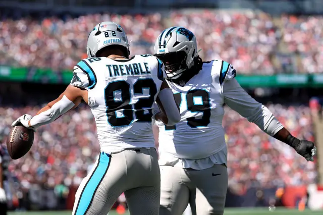 Tommy Tremble #82 of the Carolina Panthers celebrates a touchdown reception against the New England Patriots