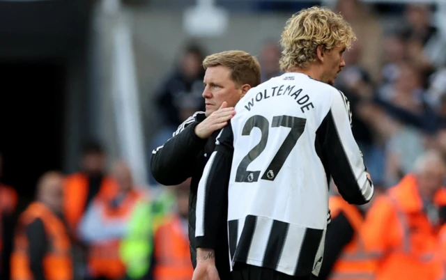 Newcastle United's Nick Woltemade with manager Eddie Howe