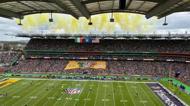 Steelers fan unfurl a huge terrible towel before the game