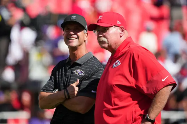 Kansas City Chiefs Head Coach Andy Reid and Baltimore Ravens Head Coach John Harbaugh look on