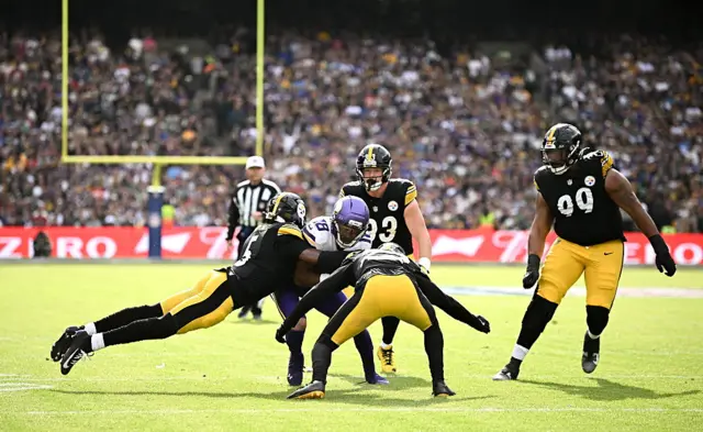 Minnesota Vikings wide receiver Justin Jefferson #18 is tackled by Cornerback Jalen Ramsey