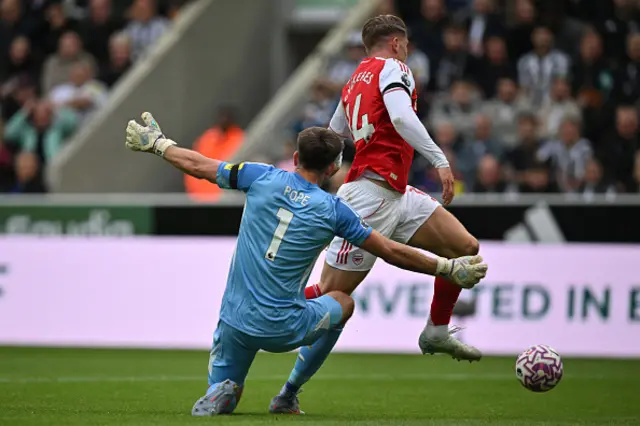 Viktor Gyokeres seems to have been fouled by Newcastle United's English goalkeeper #01 Nick Pope
