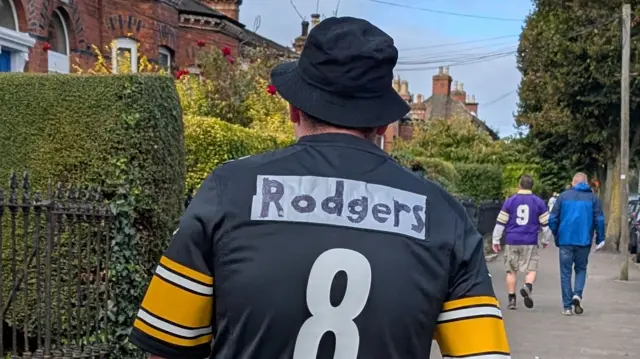 A Steelers fan with a homemade Rodgers jersey