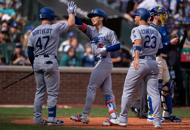 Hyeseong Kim celebrates home run