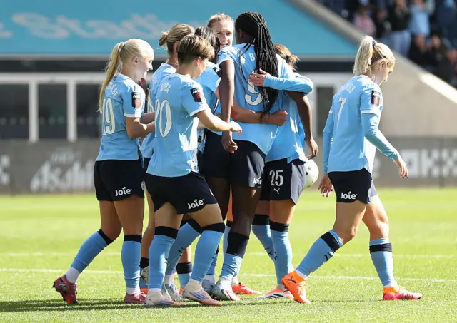 Khadija Shaw of Manchester City celebrates scoring her team's third goal during the Barclays Women's Super League match between Manchester City and London City Lionesses at Joie Stadium on September 28, 2025 in Manchester, England.