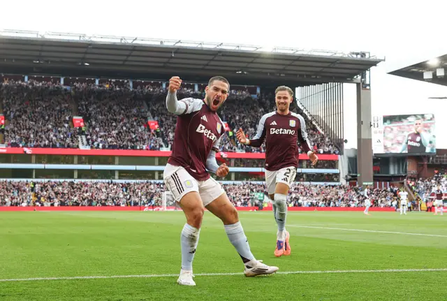 Emiliano Buendia celebrates after making it 3-1 to Aston Villa against Fulham