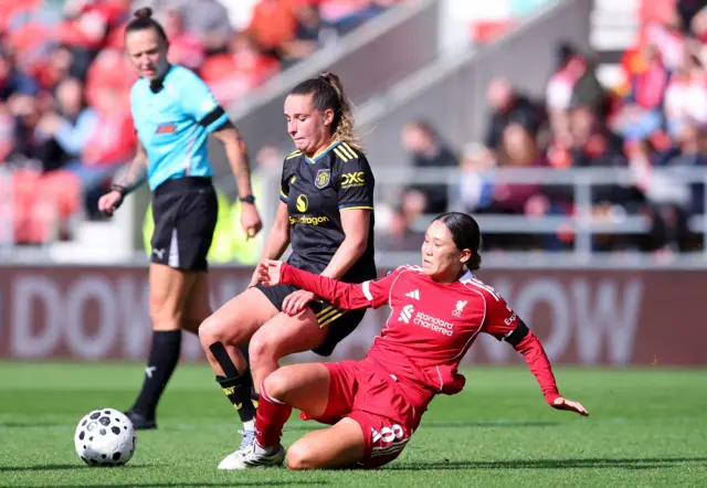 Manchester United's Ella Toone in action with Liverpool's Fuka Nagano