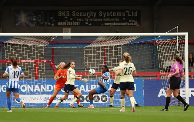 Michelle Agyemang of Brighton & Hove Albion scores her team's first goal past goalkeeper Emily Ramsey of Everton during the Barclays Women's Super League match between Brighton & Hove Albion and Everton at Broadfield Stadium on September 28, 2025 in Crawley, England.