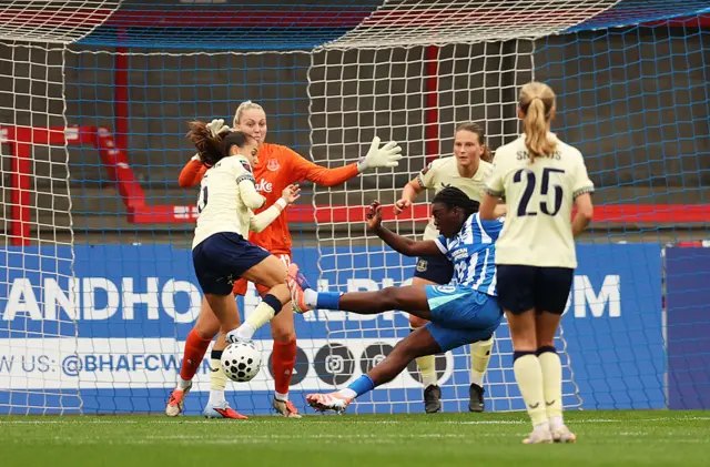 Michelle Agyemang of Brighton & Hove Albion scores her team's first goal past goalkeeper Emily Ramsey of Everton during the Barclays Women's Super League match between Brighton & Hove Albion and Everton at Broadfield Stadium on September 28, 2025 in Crawley, England.
