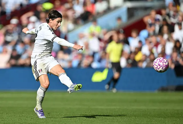 Harry Wilson shoots for Fulham against Aston Villa at Villa Park