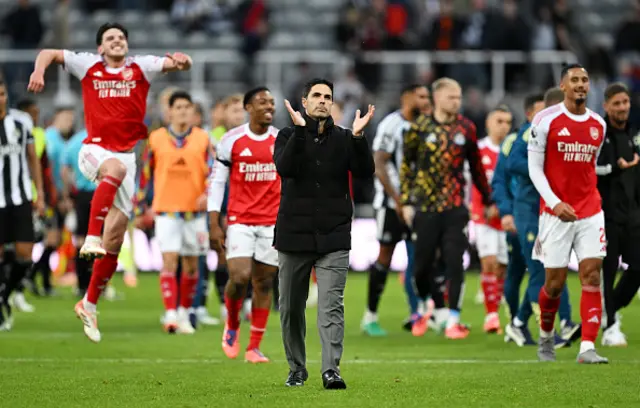 Mikel Arteta, Manager of Arsenal, applauds the fans