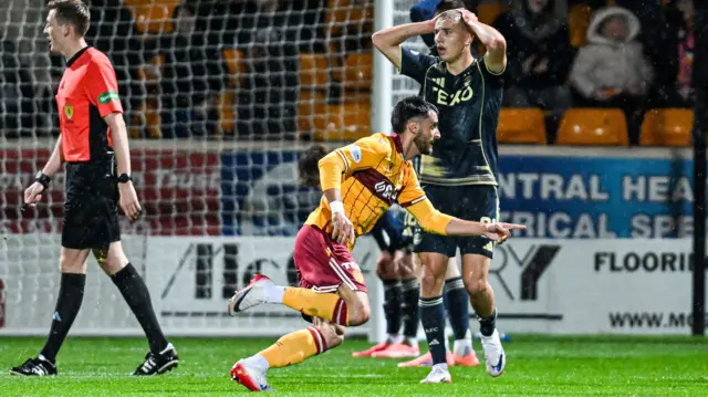 John Koutroumbis celebrates after scoring for Motherwell against Aberdeen
