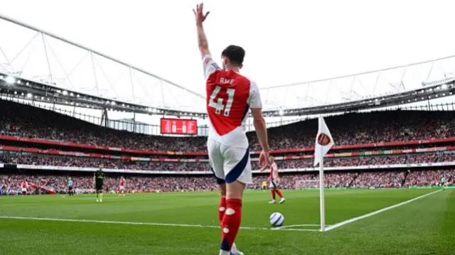 Declan Rice of Arsenal raises his arm